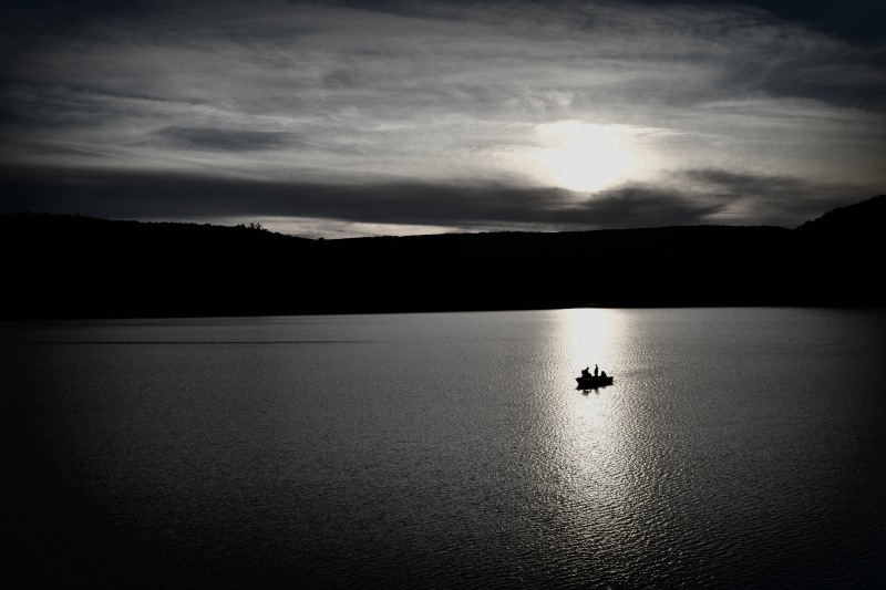 Two fishermen on Devil Lake one autumn evening